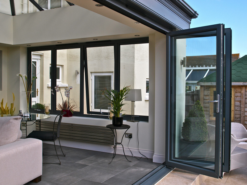 Large black sliding doors and windows